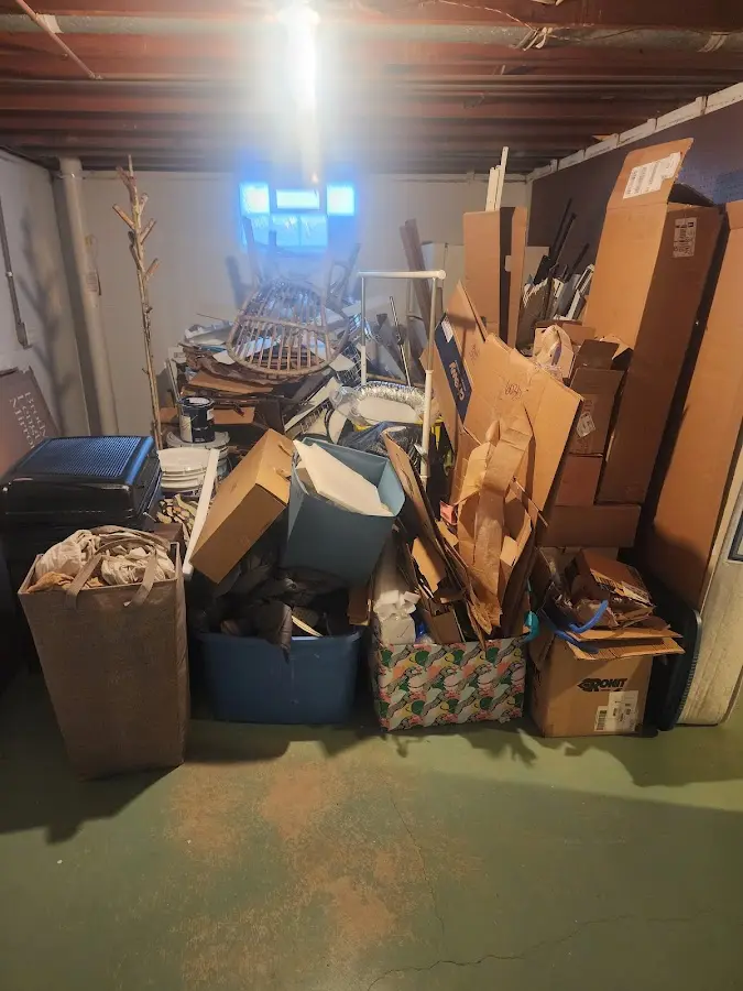 Roll-off dumpster container at job site for 2 Yard Dumpster Rental in Sherman